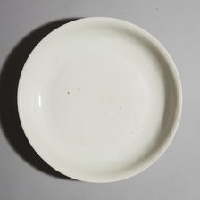 White dish with anhua design of two phoenix and cloud scroll design, Song dynasty, c.1300. Artist: Unknown.