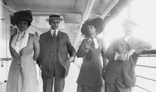 Mrs. G. Gould, Jay Gould, Marjorie Gould, and Geo. Gould, in boat deck, 1911. Creator: Bain News Service.