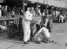 Mechanic working on a Talbot 105 at the JCC Double Twelve race, Brooklands, 8/9 May 1931. Artist: Bill Brunell.