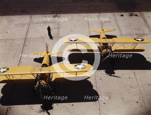 Navy N2S primary land planes at the naval Air Base, Corpus Christi, Texas, 1942. Creator: Howard Hollem.