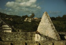 Ruins of an old sugar mill and plantation house, vicinity of Christiansted, Saint Croix, V.I., 1941. Creator: Jack Delano.