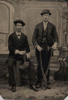 Two Stovepipe Makers, One with a Hammer and Tin Snips..., 1880s. Creator: Unknown.