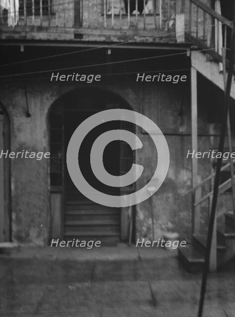 Courtyard, New Orleans, between 1920 and 1926. Creator: Arnold Genthe.