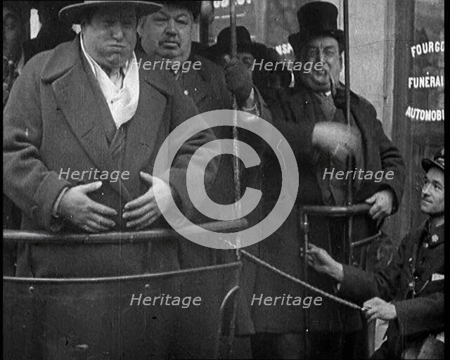 Film 'Fat Man's Outing'. Large Men Getting on a Paris Bus, 1921. Creator: British Pathe Ltd.