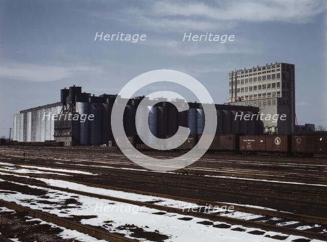 The giant 10 million bushel grain elevator of the Santa Fe R.R., Kansas, 1943. Creator: Jack Delano.