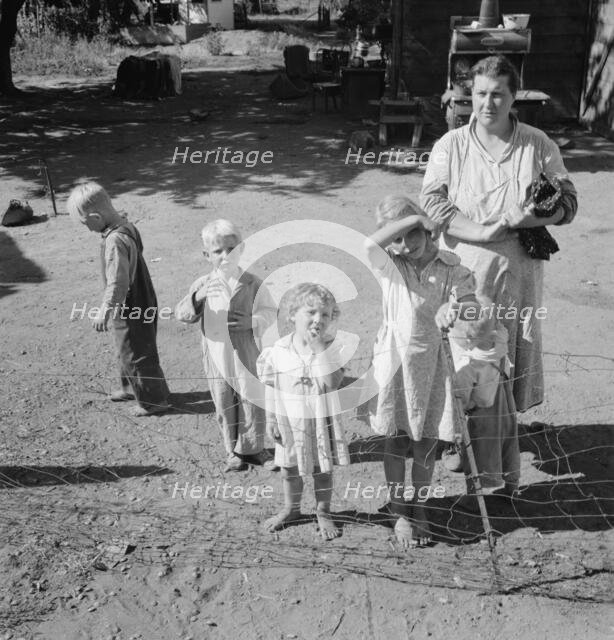 Possibly: Family living in shacktown community, mostly from..., Washington, Yakima Valley, 1939. Creator: Dorothea Lange.