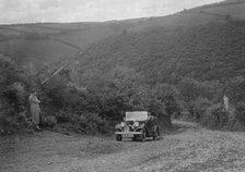 Austin 10 competing in the Mid Surrey AC Barnstaple Trial, Beggars Roost, Devon, 1934. Artist: Bill Brunell.