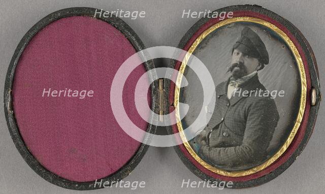 Portrait of a man with a busy moustache and goatee, wearing an angled cap, about 1850. Creator: Unknown.