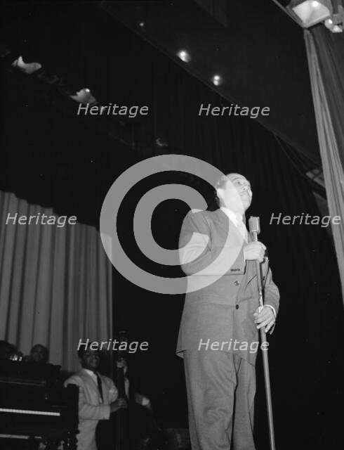 Portrait of Duke Ellington and Junior Raglin, Howard Theater(?), Washington, D.C., 1938. Creator: William Paul Gottlieb.