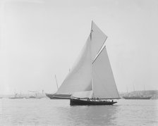The gaff rigged cutter 'Bloodhound' sailing in light winds, 1908. Creator: Kirk & Sons of Cowes.