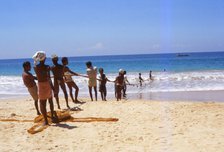 Pulling in Fishing Net from Indian Ocean, Hikkaduwa, West Coast Sri Lanka, 20th century. Artist: CM Dixon.