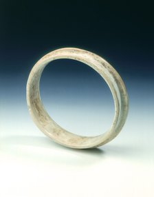 Altered jade flanged ring, Shang dynasty or earlier, China, c1600-1100 BC. Artist: Unknown