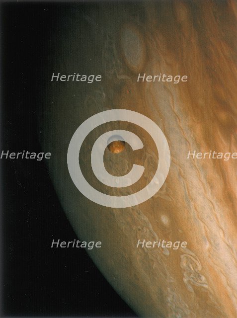 Jupiter and Io, one of its moons, 1979. Artist: Unknown