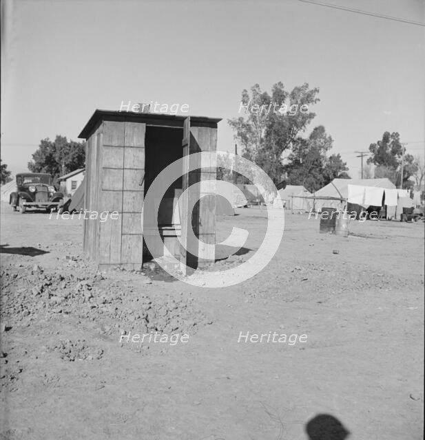 Sanitary facilities in camp of carrot pullers, near Holtville, Imperial Valley, California, 1939. Creator: Dorothea Lange.