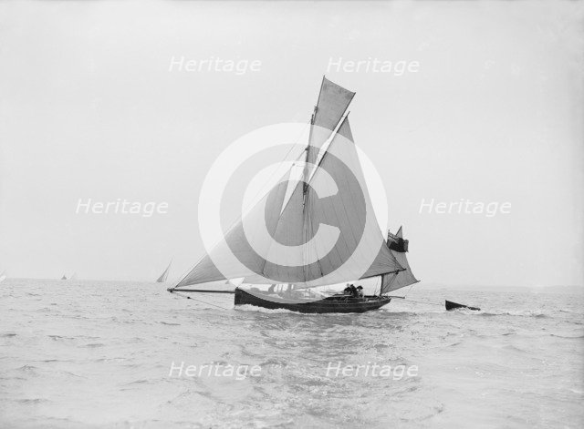 The yawl 'Lola' under sail, 1913. Creator: Kirk & Sons of Cowes.