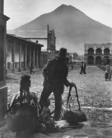 Plaza and volcano of Antigua, Guatemala, between 1899 and 1926. Creator: Arnold Genthe.