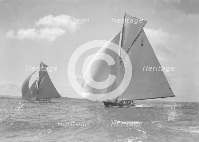 'Rollo' (foreground) and 'Javotto' racing under spinnaker, 1911. Creator: Kirk & Sons of Cowes.