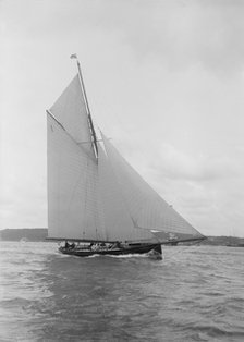 The gaff rigged cutter 'Bloodhound' sailing close-hauled, August 1912. Creator: Kirk & Sons of Cowes.