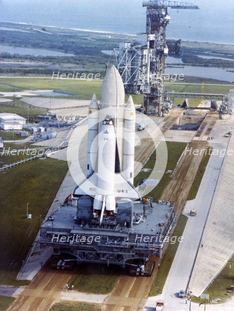 Crawler moving Space Shuttle to launch complex 39, Kennedy Space Center, USA, 1980s. Creator: NASA.