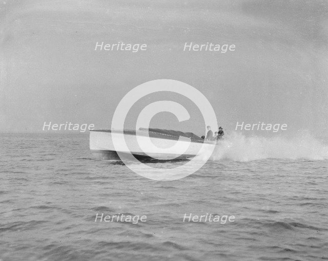 The 40 ft hydroplane 'Pioneer' under way. Creator: Kirk & Sons of Cowes.