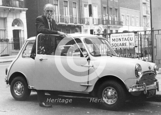 Lord Montagu with Mini in London, mid 1960's. Creator: Unknown.