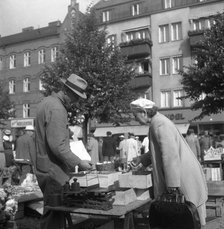 Scene in the market, Malmö, Sweden, 1947. Artist: Otto Ohm