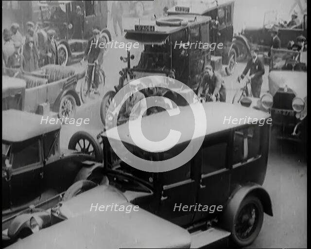 Streets Filled With Heavy Traffic and Pedestrians in London, 1926. Creator: British Pathe Ltd.