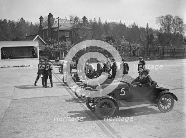 Morris, Morgan and Crouch cars on the start line of a motor race, Brooklands, 1914. Artist: Bill Brunell.