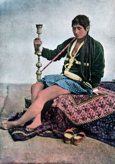 Persian woman smoking in Kalgan, c1890. Artist: Unknown