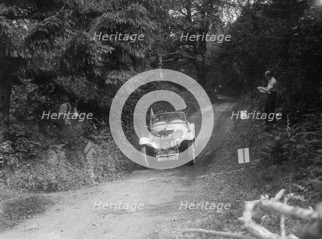 1934 Singer Le Mans of the Candidi Provocatores team taking part in a motoring trial, late 1930s. Artist: Bill Brunell.