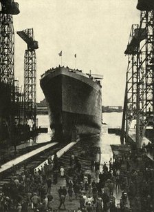 'Built in a Belfast Shipyard - The launching of the Edinburgh Castle, a fine ship built recently for Creator: Unknown.