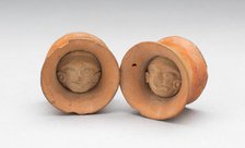 Pair of Earspools with Face in Interior, Possibly AD 450/1000. Creator: Unknown.
