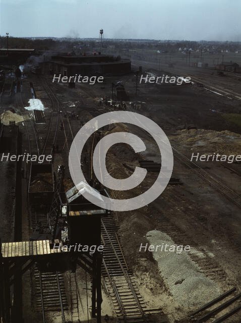 Track repair work at the Bensenville yard of the Chicago, Milwaukee..., Illinois, 1943. Creator: Jack Delano.