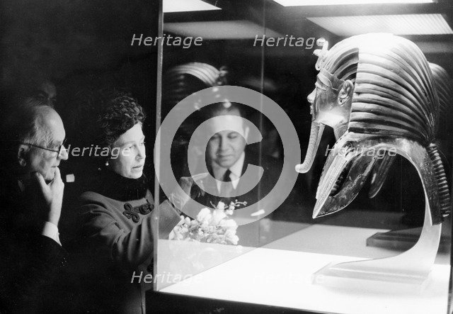 Queen Elizabeth II looks at the mask of King Tutankhamun, British Museum, London, 1972. Artist: Unknown