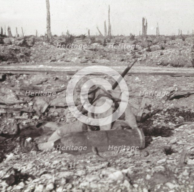 Soldier with shell, Bois d'Avocourt, Verdun, northern France, c1914-c1918. Artist: Unknown.