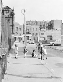 Children playing on Hopetown Street, London. Artist: Willson