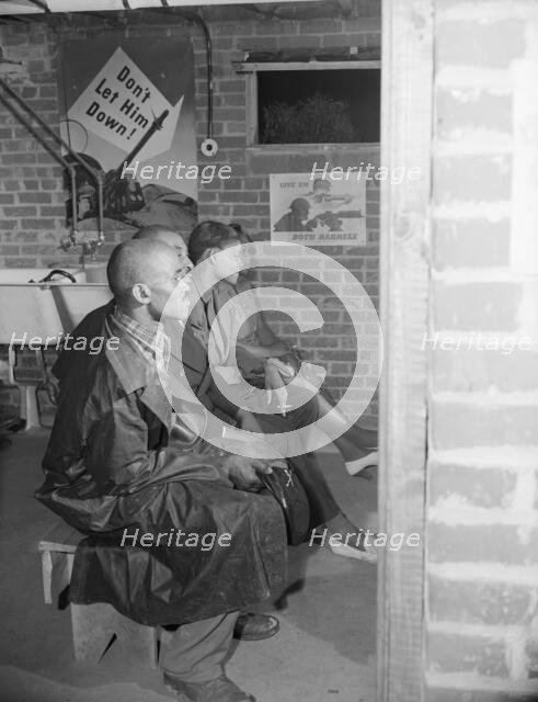Air raid wardens' meeting in zone nine, Southwest area, Washington, D.C, 1942. Creator: Gordon Parks.