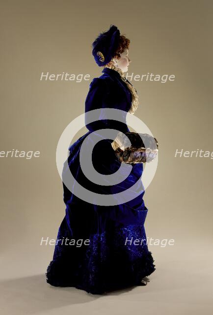 Woman's two-piece dress ensemble with matching hat, blue silk velvet., c.1880. Creator: Unknown.