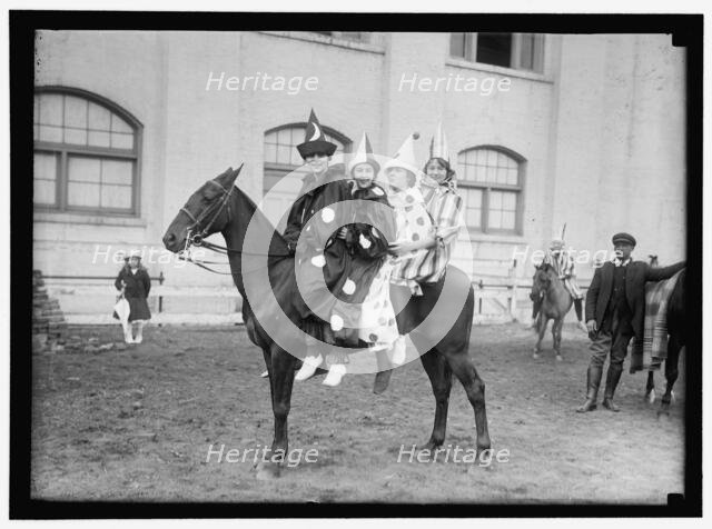 Society Circus - clowns on horseback, between 1909 and 1923. Creator: Harris & Ewing.