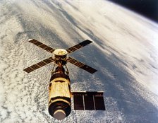 Skylab in orbit above Earth at the end of its mission, 1974. Creator: NASA.