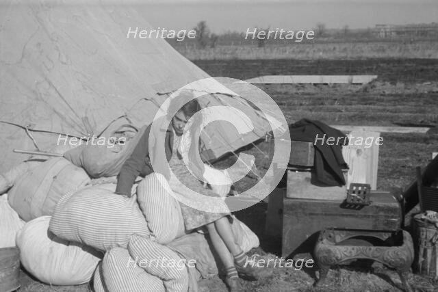 A girl in the camp for white flood refugees, Forrest City, Arkansas, 1937. Creator: Walker Evans.