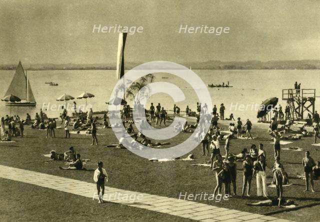 Bathers on the shores of Lake Constance, Bregenz, Austria, c1935. Creator: Unknown.