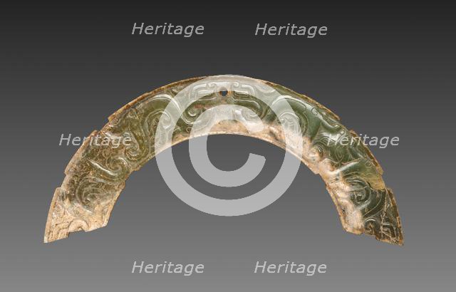 Arc-shaped Pendant with Animal Mask and Interlaced Animal Bands (Huang), 300-100 BC. Creator: Unknown.