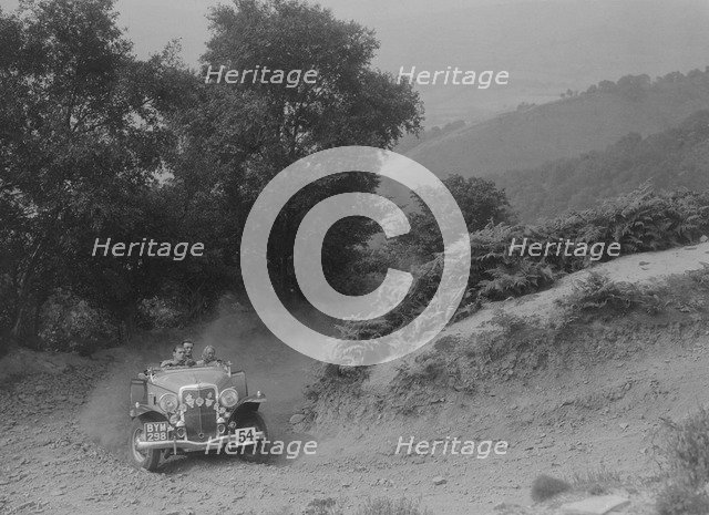 Ford V8 competing in the Barnstaple Trial, c1935. Artist: Bill Brunell.