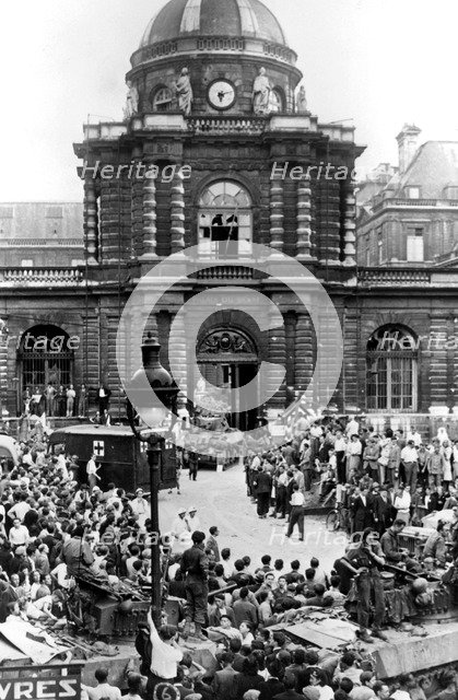 Evacuation of German wounded after the surrender of the Senate, liberation of Paris, August 1944. Artist: Unknown
