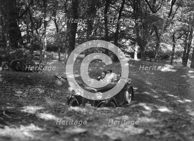 Singer taking part in the B&HMC Brighton-Beer Trial, Fingle Bridge Hill, Devon, 1934. Artist: Bill Brunell.