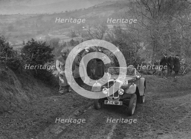 Austin 7 Grasshopper of TH Cole competing in the MG Car Club Midland Centre Trial, 1938. Artist: Bill Brunell.