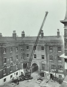 Firemen demonstrating the magirus ladder, London Fire Brigade Headquarters, London, 1910. Artist: Unknown.