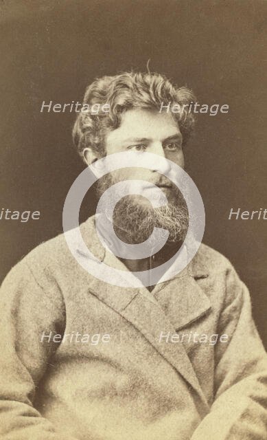 Half-length portrait of a man, dressed in convict clothing, facing right, between 1880 and 1886. Creator: Unknown.