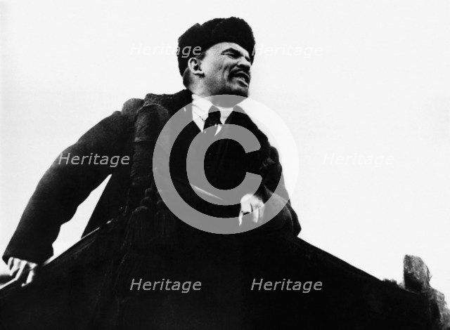 Vladimir Ilich Lenin, Russian Bolshevik revolutionary leader, speaking from a rostrum, 1917. Artist: Unknown